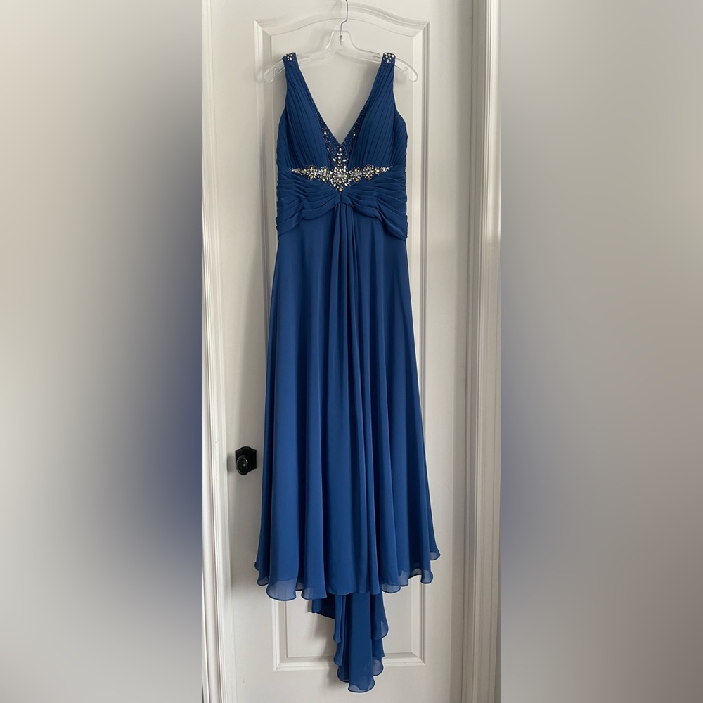 La Perle blue low-back evening gown